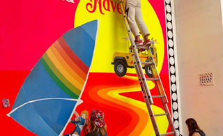 Paige and crew painting a mural in the Hayes Valley store
