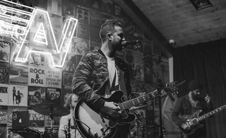 A musician playing the Aviator Nation Austin stage