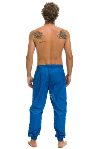 MEN'S 4 STRIPE WIND PANT - SNORKEL BLUE Outerwear Aviator Nation