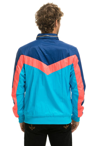 MEN'S WINDBREAKER JACKET- NEON BLUE Men's Windbreaker Aviator Nation