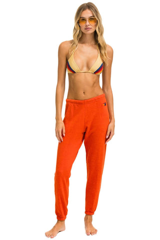 RIDE LOGO WHITE SWEATPANTS - ORANGE Women's Sweatpants Aviator Nation