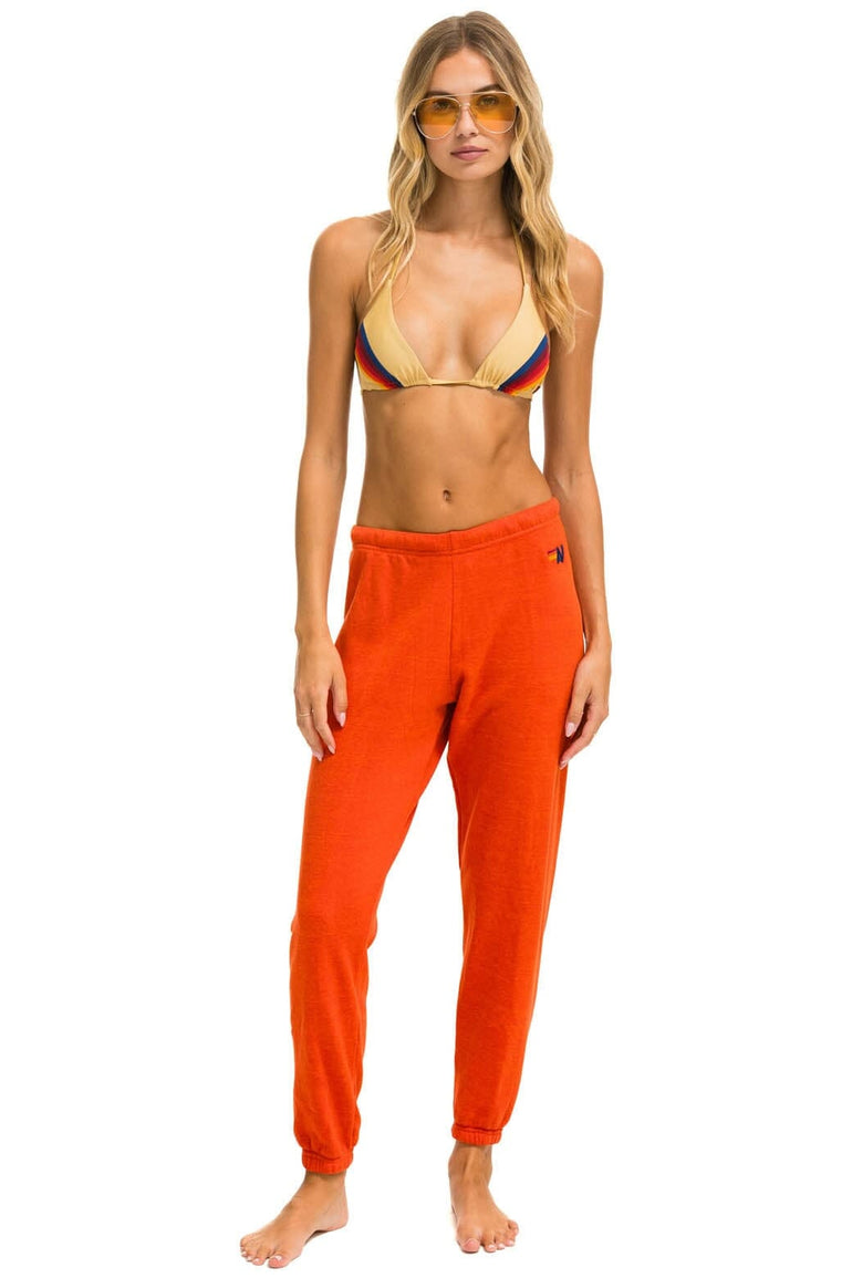 RIDE LOGO WHITE SWEATPANTS - ORANGE Women's Sweatpants Aviator Nation