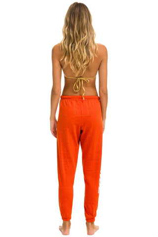 RIDE LOGO WHITE SWEATPANTS - ORANGE Women's Sweatpants Aviator Nation