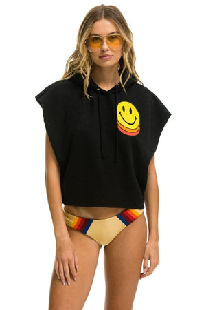 SMILEY SUNSET SLEEVELESS RELAXED CROPPED PULLOVER HOODIE - BLACK
