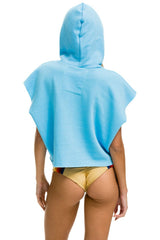 SMILEY SUNSET SLEEVELESS RELAXED CROPPED PULLOVER HOODIE - SKY Aviator Nation
