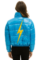 WOMEN'S BOLT LUXE APRES PUFFER JACKET - GLOSSY OCEAN Jacket Aviator Nation