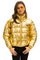 WOMEN'S BOLT LUXE APRES PUFFER JACKET - METALIC GOLD Jacket Aviator Nation
