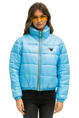 WOMEN'S SUNBURST APRES PUFFER JACKET - GLOSSY SKY Jacket Aviator Nation