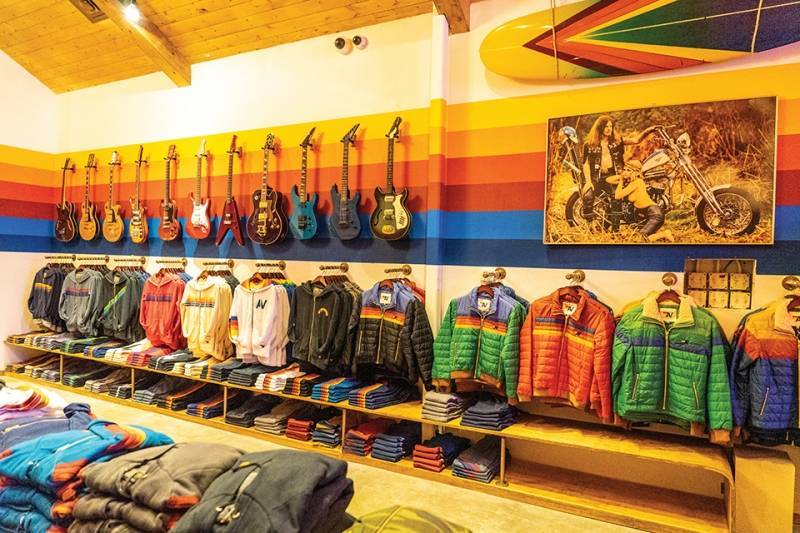 An image of the interior of an Aviator Nation retail store