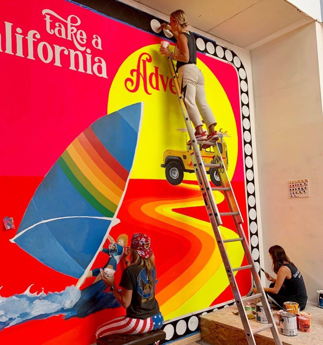 Paige and crew painting a mural in the Hayes Valley store