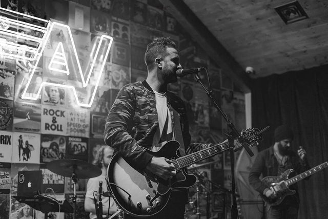A musician playing the Aviator Nation Austin stage