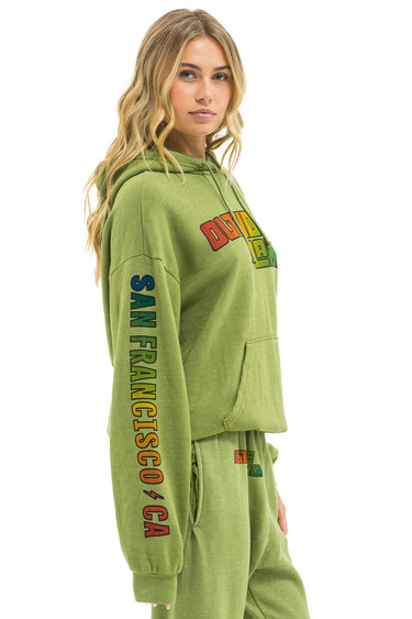 OUTSIDE LANDS 2025 RELAXED PULLOVER HOODIE - JUNGLE GREEN