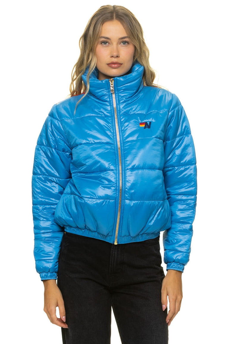 SUNBURST APRES PUFFER JACKET - GLOSSY OCEAN