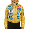 VINTAGE PATCH APRES PUFFER JACKET - HONEY GLOSSY Women's Outerwear Aviator Nation 