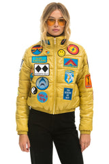 VINTAGE PATCH APRES PUFFER JACKET - HONEY GLOSSY Women's Outerwear Aviator Nation 