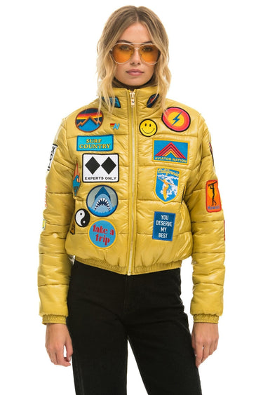 VINTAGE PATCH APRES PUFFER JACKET - HONEY GLOSSY Women's Outerwear Aviator Nation 