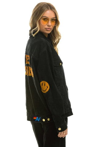 KEEP SMILING OVERSIZED CONCERT DENIM JACKET - VINTAGE BLACK Denim Jacket Aviator Nation 